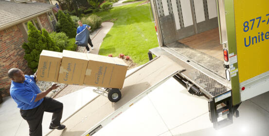 Loading moving boxes to truck